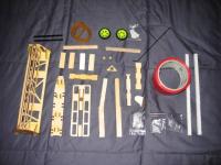 Name: wasp-24.jpg
Views: 289
Size: 41.6 KB
Description: Hardware package right out of the box(notice plywood parts are preassembled) you even get a roll of red wing tape that is used to cover the elevator and rudder and wing surface.
