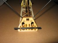 Name: wasp-29.jpg
Views: 177
Size: 85.0 KB
Description: then the landing gear is installed and a small spacer is added to keep it in place (note make sure that the gear is straight then glue in the gear using some 5 minute epoxy and the little wood brace)