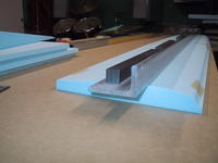 Name: IMG_4264.jpg
Views: 438
Size: 51.3 KB
Description: There are many ways of cutting out the spar foam core. I like to use a big aluminum angle as a square guide.