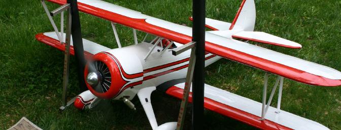 Rather than remove the engine from the plane and mount it on a stand, I bolted the wings to the Stearman and took it to my �engine testing area� in the back yard.  
