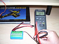 Name: 100_2364.jpg
Views: 46
Size: 200.7 KB
Description: This shows the battery voltage. 6.97vdc.

 I ran the battery on my fan (next pic) for a few minutes before I got this picture.