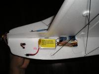 Name: gear - left side.jpg
Views: 806
Size: 68.1 KB
Description: using the pull-pull setup I kind of painted myself into a corner...  I didn't have room for the wiring because of the lines.  Then I figured out that I could mount the receiver so that the wires connect on the other side.  I'm sure I'm not 