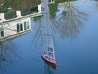 Name: Windom US1M.jpg
Views: 86
Size: 203.7 KB
Description: FG over gelcoat from a home made mold.  Local legend has it that the design is cross between a Bob Sterne Venom (forward sections) and a Kyosho Seawind (aft sections) but who knows?  I call it the Windom.