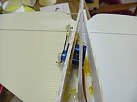 Name: DSCF0877.jpg
Views: 652
Size: 81.6 KB
Description: Elevator servo. Again, I normally run a few spotwelds on the outside, but this time I glued on the inside. Sorry so untidy!