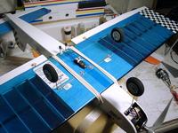Name: 01010064.jpg
Views: 318
Size: 74.2 KB
Description: Aileron servo setup for aileron differential.  This may get changed.  Stock wheels and landing gear.