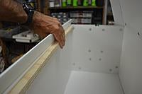 Name: Box 22.jpg
Views: 99
Size: 103.4 KB
Description: The plywood strip goes here, and fold the excess bit down onto it.