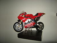 Name: DSCN0957.jpg
Views: 79
Size: 125.5 KB
Description: This was my first RC Bike, has every upgrade available.