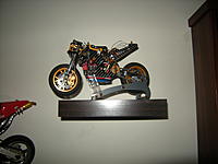 Name: DSCN0958.jpg
Views: 71
Size: 120.8 KB
Description: This is my recent addition. ZH201B with chain, brakes all round. Waiting for new shell.