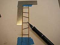 Name: P1010114 copy.jpg
Views: 95
Size: 23.5 KB
Description: Square the end of the second rail, and
set some of the rungs for spacing.