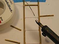 Name: P1010121 copy.jpg
Views: 86
Size: 32.5 KB
Description: Melt a small amount of solder on the end of the soldering iron.