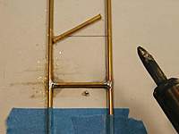 Name: P1010127 copy.jpg
Views: 99
Size: 32.0 KB
Description: Bottom rung is complete, Now to just
square up the betweens, and solder all
those rungs in place.
