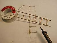 Name: P1010130 copy.jpg
Views: 86
Size: 29.8 KB
Description: The ladder is off the paper, and ready to be cleaned up. This entire set up used 1/16" brass rod, and was done, start to finish in less than a half hour... Your turn... :)