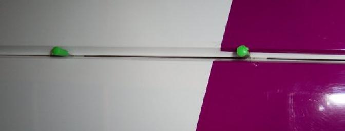 I used pins to hold the hinge equally in each side of the surface and dripped thin CA in each one.