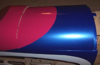 From the factory, my preproduction model's hatch was covered backward...here's the hatch on backward, with colors matching.