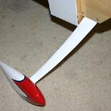 The landing gear was very easy to assemble and the swept back painted fiberglass looked great! All of the holes in the wheelpants were pre-drilled. I simply bolted on the axles, slid some wheels on, cut the axle to length and bolted on the wheelpant, then