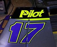 Name: 20120830_220056.jpg
Views: 27
Size: 152.1 KB
Description: Replaced the white "PILOT" iron on stuff with the yellow air release vinyl. Should add some decent contrast to the top of the rudder