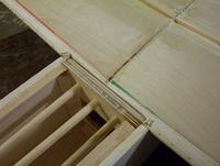 Name: 100_7275.jpg
Views: 85
Size: 78.5 KB
Description: Ready for gluing. Note dowels only pushed partially through to hold the wing mounting plate in place for gluing.