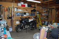 Name: DSC_0428.jpg
Views: 68
Size: 110.0 KB
Description: Having a bike infront of the shelves makes it hard to get to stuff.