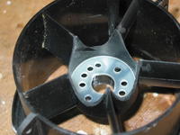 Name: Motor cooling.jpg
Views: 139
Size: 47.2 KB
Description: Midifan motor tube scalloped out for cooling.  Not yet added are small slivers of plywood at the base of each stator to hold the motor rigid against vibrating.