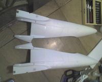 Name: Stock Island cut out and packing tape liner.jpg
Views: 649
Size: 50.1 KB
Description: Nose section halves of kit with the stock splitters cut out and ready for placement of extensions.