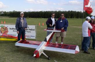 The builders pose with their night flyer