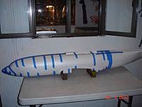 Name: DSC04410R.jpg
Views: 62
Size: 50.1 KB
Description: Watching the glue set. The tail section had been glued together before.