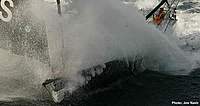 Name: BOSS 5.jpg
Views: 133
Size: 35.9 KB
Description: Hugo Boss showing how wet it really is on an IMOCA 60