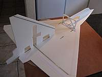Name: b2.jpg
Views: 2484
Size: 40.9 KB
Description: Glue the upper components in place first.  Make sure the wing stays flat � it is easiest to work on the corner of the work surface.