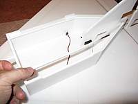 Name: b6.jpg
Views: 2412
Size: 38.8 KB
Description: Glue the 6mm x 6mm depron strips in position along the upper edge of the fuselage sides.  These allow the corners to be sanded round later.