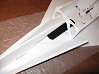 Name: b8.jpg
Views: 2586
Size: 53.8 KB
Description: Glue the battery mount velcro in position and then install the triangular left and right hand nose sides.