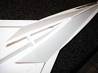 Name: b94.jpg
Views: 2572
Size: 51.4 KB
Description: Install the left and right hull sides after chamfering the edges.  After installation, sand the bottom edges to match the fuselage profile, forming a flat seat for the ski.