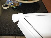 Name: b97.jpg
Views: 2405
Size: 52.7 KB
Description: Glue the tip floats in place under the wing, just outboard of the elevons