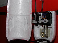 Name: P1200192.jpg
Views: 232
Size: 87.9 KB
Description: Notice where they hogged out the foam in the upper cover to clear the servos.  Originally designed for linears?