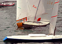 Name: 2010.0912.9406.jpg
Views: 490
Size: 133.4 KB
Description: The action gets a little close as S/B 1041 entangles 373 when the situation gets tight and crowded during one heat of Sunday's Santa Barbara One Class races.