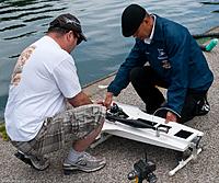 Name: 2011.06.18.0002.jpg
Views: 98
Size: 299.2 KB
Description: Julio (Racer59) gives a Dave (gtopillado on RCGroups) a hand starting his boat and...
