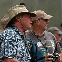 Name: 2012-06-30_159.jpg
Views: 17
Size: 240.5 KB
Description: Ken Campbell (Boat 81) and Dan Robinson (Boat 505)...   Note the micro Video Camera clipped to the top of Ken's hat.  Great trick to record your races and check your performance!!