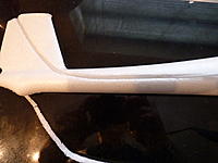 Name: P1000223.jpg
Views: 131
Size: 146.2 KB
Description: With the snake fitted. Keep the cut out piece and trim the v to fit over the snake. Real careful work here.