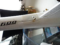 Name: P1000268.jpg
Views: 151
Size: 111.2 KB
Description: The elevator servo and snake covered with a piece of white tape for appearances.
