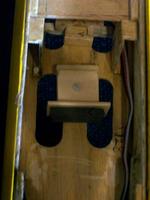 Name: aerowattbattblock.jpg
Views: 62
Size: 18.1 KB
Description: Rear battery retention block. Made from a small block of balsa, hard faced by window blind offcuts (similar to 1/8th ply) and with a fantastic foam pad. The nylon bolt locates in a captive nut set into the reinforced ply battery plate beneath. If necessar