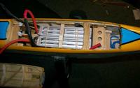 Name: aerowattbattsin.jpg
Views: 78
Size: 19.1 KB
Description: View of battery compartment with batteries inserted. 2 off 3s1p 4300mah Loong Max packs in series. The final battery retention is by the cross-mounted lolly stick, which is rotated into position to be braced between the fuselage side preventing any up-and