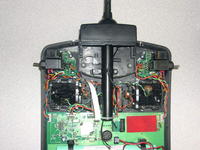 Name: DSCN4054.jpg
Views: 1575
Size: 131.7 KB
Description: Antenna in position with wire out the bottom. Friction holds the antenna in place. Add velcro as shown.