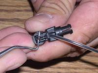 Name: DSCN4029.jpg
Views: 1089
Size: 74.8 KB
Description: You'll need to run the antenna down the antenna so you will have to pull it out with a small poined tool. We used a dental tool.