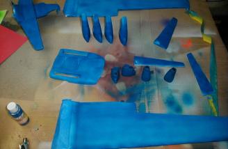 Applying a dark color over white foam requires several light coats.