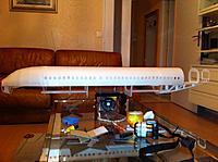 Name: IMG_0647.jpg
Views: 342
Size: 227.1 KB
Description: Cargo holds! At the beginning, I thought about putting batteries down there (closest to the wingbox) but I'm actually scared the belly covering them falls off during landing...