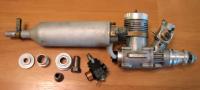 Name: K&B 7.5 2s.jpg
Views: 107
Size: 40.9 KB
Description: K&B 7.5 engine with Magic Muffler, extra drive parts, and alternate Perry carburetor