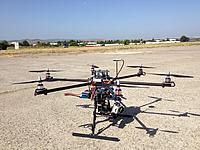 Name: IMG_0105.jpg
Views: 35
Size: 160.2 KB
Description: Following the Okto2, I built this larger hexacopter using the AGP frame and DJI Wookong-M system.  Extremely stable.  Later it was fitted with some 2800 size motors for heavy lifting.