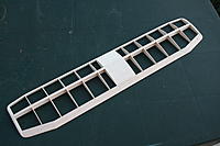Name: 20120729_IMG_1106.jpg
Views: 97
Size: 132.5 KB
Description: Bottom wing finished with 1/4" balsa tips then carved and sanded, just requires LE riblets which will be added when top wing is finished.