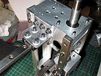 Name: IMG_7912.jpg
Views: 35
Size: 246.2 KB
Description: The top linear slide bearing has three carriages, one in the center and two mounted on "wings" on the sides.