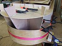 Name: Frieghter a2.jpg
Views: 211
Size: 31.0 KB
Description: Bending the door skin ply around the bow.