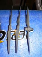 Name: P1010024.jpg
Views: 1780
Size: 116.1 KB
Description: Three APC 6x4 props.  The one in the middle is an APC 6x4e.  It has more pitch towards the center and less towards the tips.  The 6x4e is thinner. 